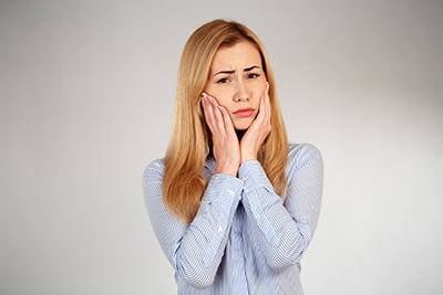 Woman with dental pain