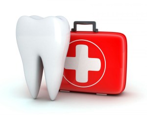 Tooth next to a first aid kid